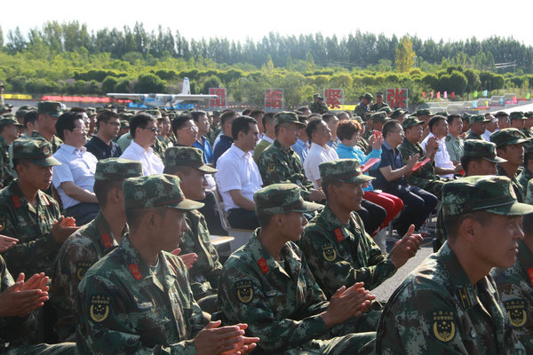 新疆消防协会组织协会理事单位参加 庆八一建